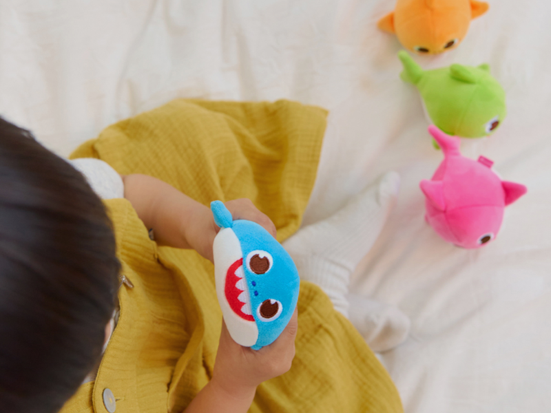 Close-up of the soft blue Baby Shark Squishy Charm Plush